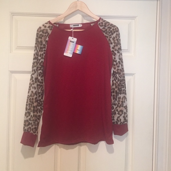 New With Tag leopard sleeve top size medium