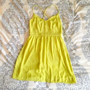 Adorable neon yellow dress with cutout back