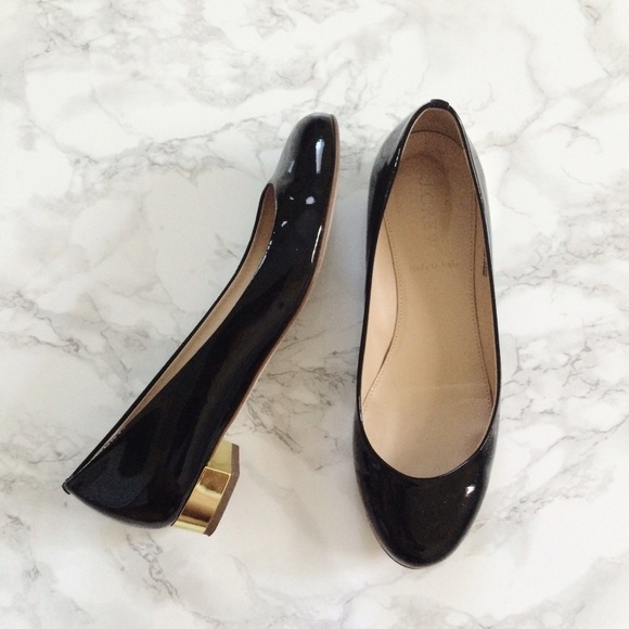 black flats with gold heel