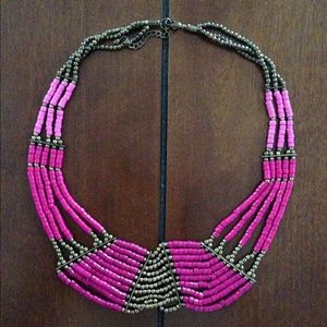 Pink and gold beaded necklace.