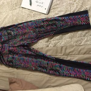 Never warn! NWOT multi color Nike capris!