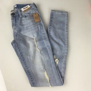 Mudd destructed ripped skinny low rise jeans.