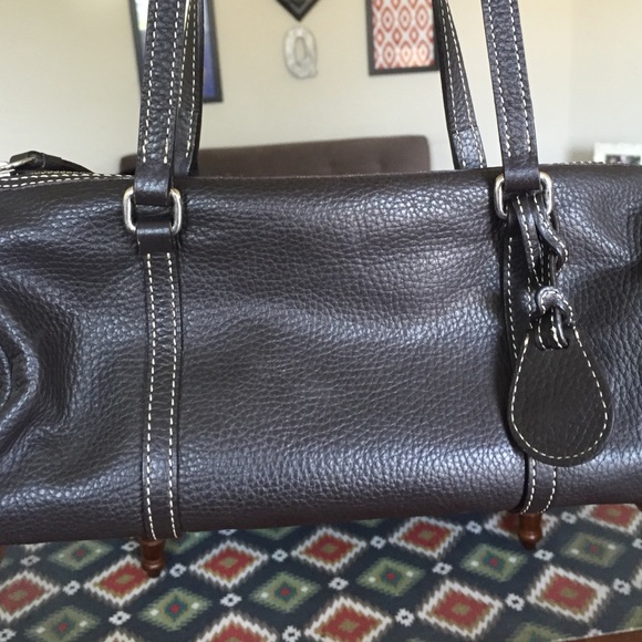 Dark brown Dooney & Bourke leather barrel bag