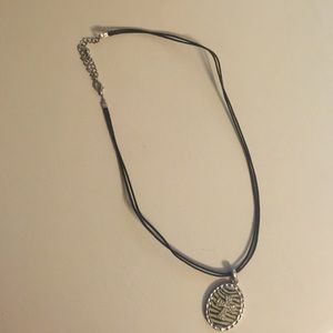 Zebra cross necklace