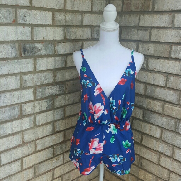 Gorgeous open back floral romper.