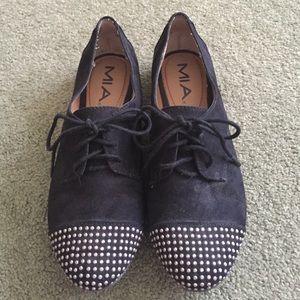 Black studded flats
