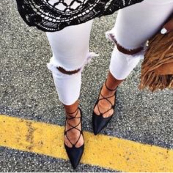 black pointed lace up flats