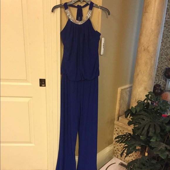 Royal blue jumpsuit from Cache. Worn only once.