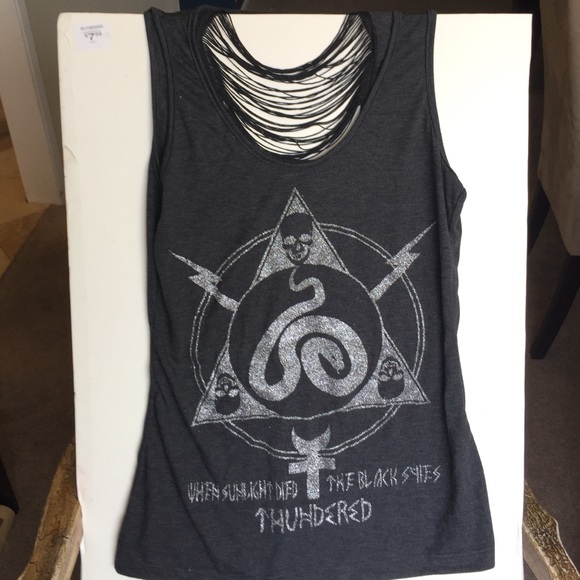 Greay tank with cut out detail. Skulls