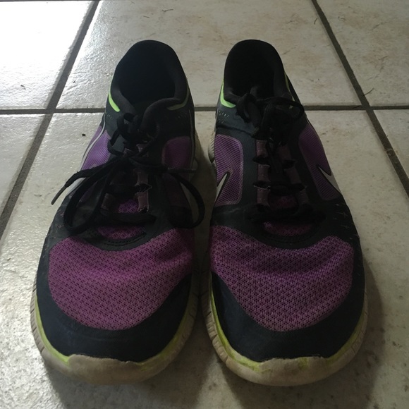 Nike tennis shoes purple and neon yellow