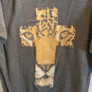 Fierce lion in a cross dolman tunic 🔥🔥