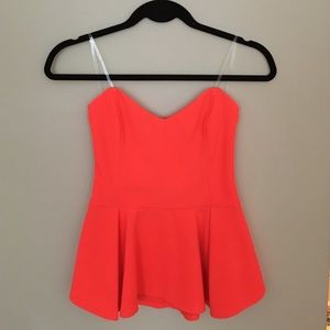 Neon orange strapless peplum top!