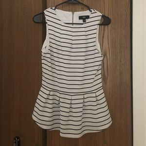 White and navy peplum tank.