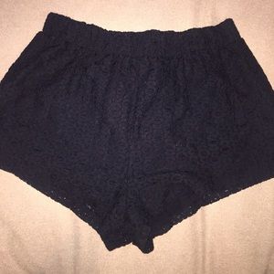Lacy black flowy shorts with elastic waistband