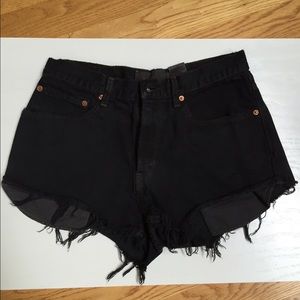 Black Levi's cut-off jean shorts