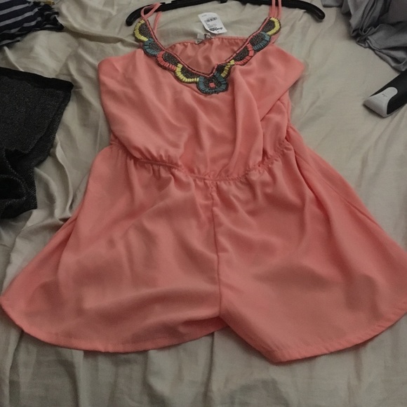 Peach colored jumpsuit