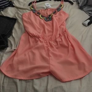 Peach colored jumpsuit