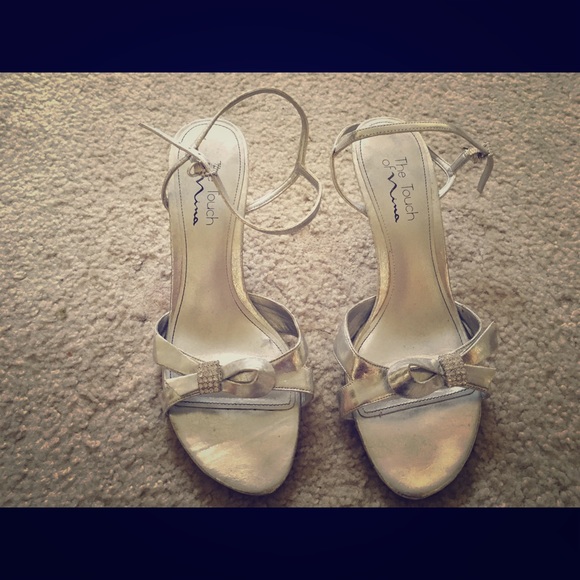 Silver heels with rhinestone bow