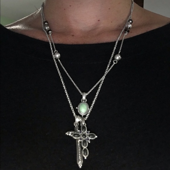 Double chain silver necklace with cross pendants.