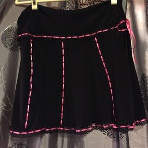 Black mini skirt with pink trim and tie