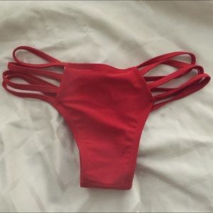 Red bikini strappy cheeky bottom