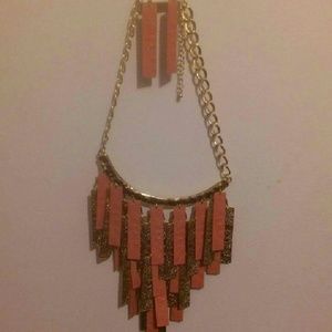 A pink jewelry set
