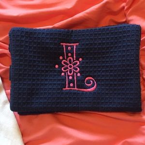 L monogrammed makeup bag