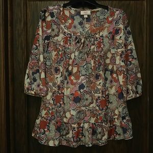 Longish blouse in crazy pattern. 3/4 sleeve