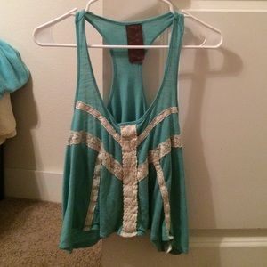 Blue blouse with white lace embellishment