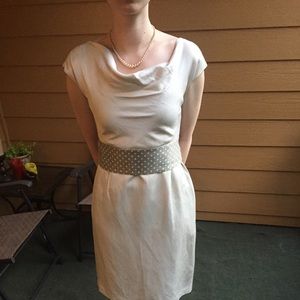 Ivory cocktail dress with belt.