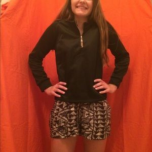 Black long sleeve shirt with golden zippers