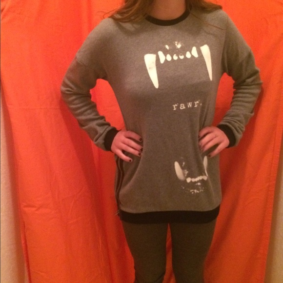 RAWR sweater with zipper detail on the side