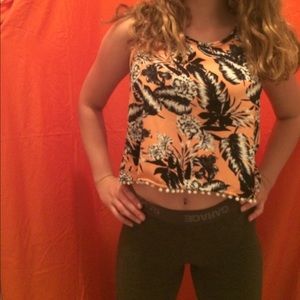 floral pink and black crop top with a back slit