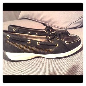 Size 8.5 Black with Gold on the sides !