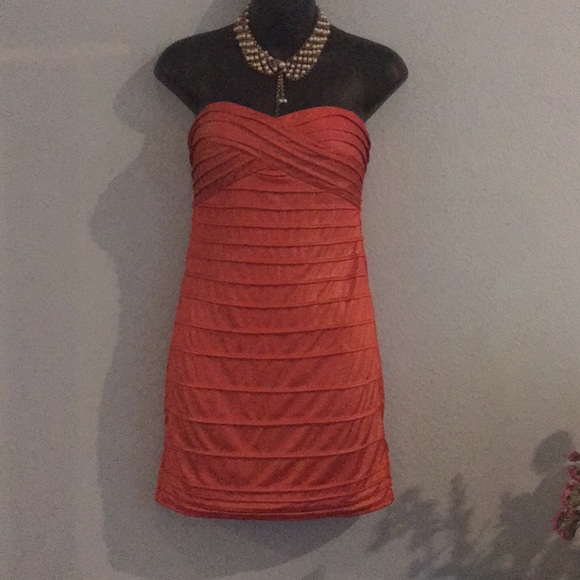 Medium- Cocktail Dress.  Very summery Coral color.