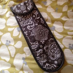 Thirty one curling/flat iron case.