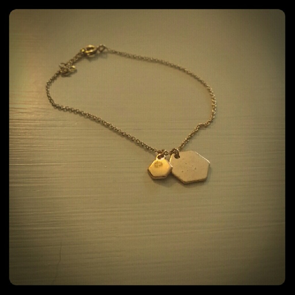 H&M Gold tone bracelet with medallion dangle