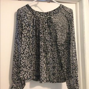 JLo animal print blouse