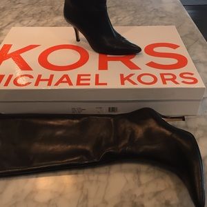 Black leather pointed toe boots zipper in the back