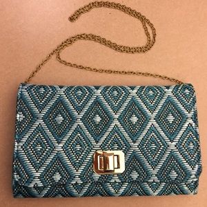 Boutique teal clutch with gold chain