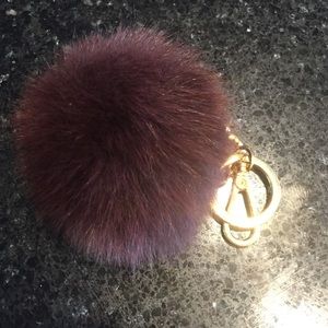 Michael kors burgundy fur key chain
