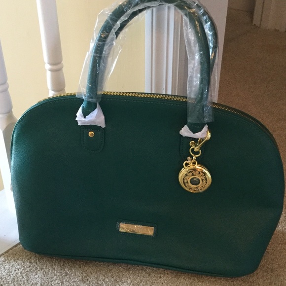 Joy Iman purse, green in color