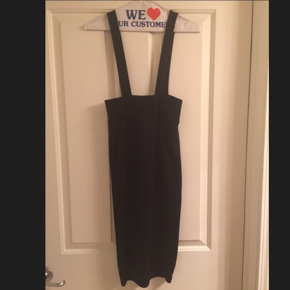 Cute below the knee pencil skirt with suspenders