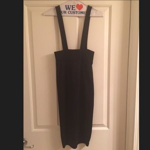 Cute below the knee pencil skirt with suspenders