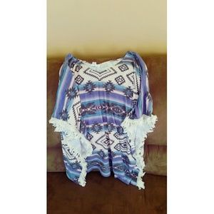Poncho like- shirt.