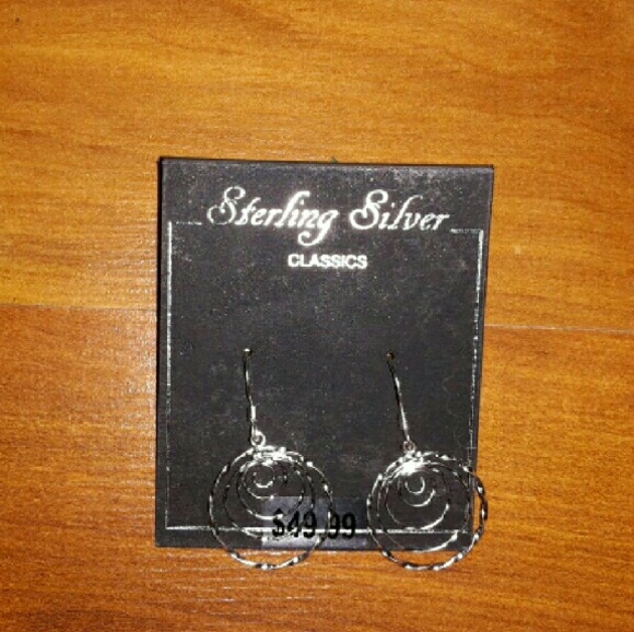 Sterling silver earrings. Brand new/Never worn.