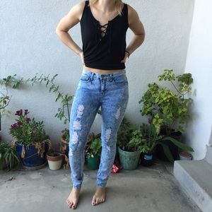 Long distressed skinny jeans