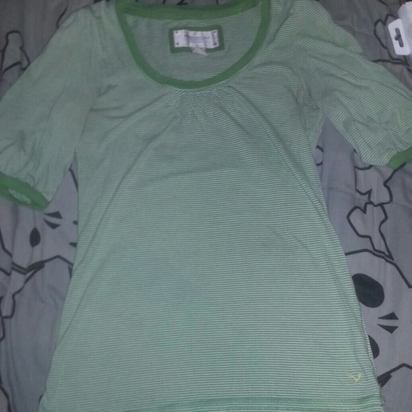 Green and white striped blouse