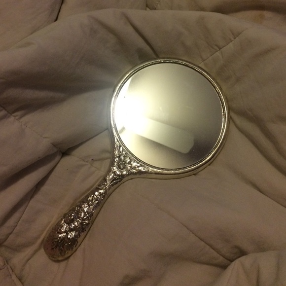 Hand held mirror