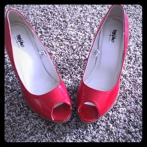 Super sassy and sexy red peep toes!